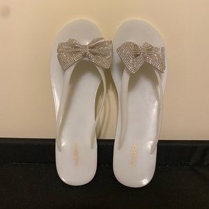 ALDO. Jelly flip flops